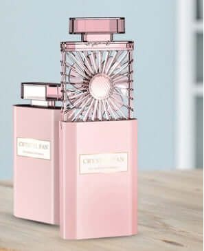 DROPPZZA Perfume fan in elegant design, showcasing crystal details and pastel pink color for luxury scent experience.