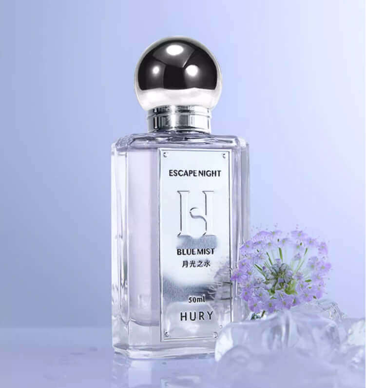 DROPPZZA Aromatic Citrus Aromatic Perfume showcasing a sleek bottle with floral accents and elegant design.